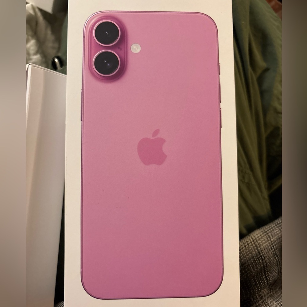 Two empty iPhone 16 plus boxes. Brand new. Colors are blue and pink.